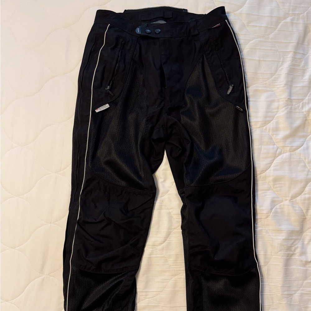 Men’s black Olympia motorcycle pants with rain insert pants, size 34